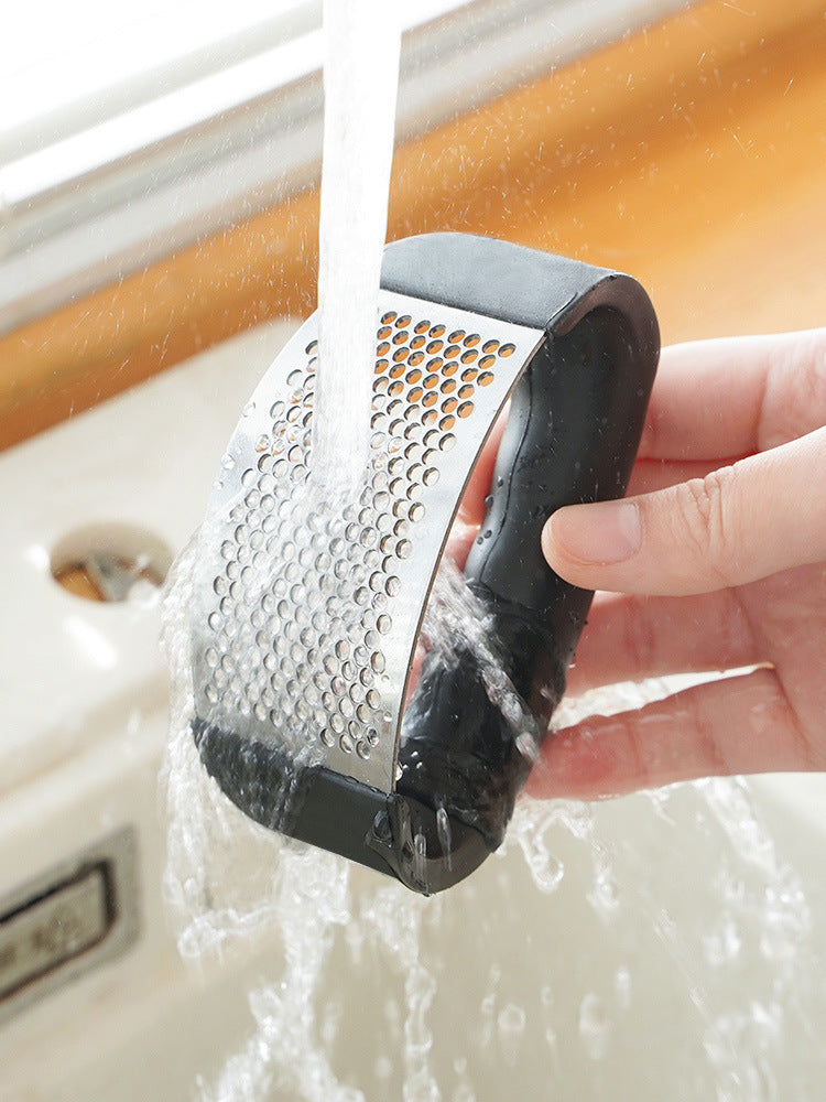 Presse-ail en acier inoxydable